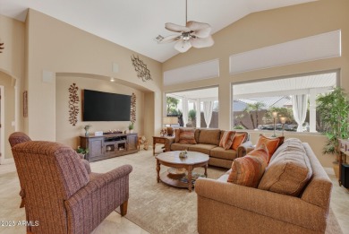 Charming home w/stone facade + extended paver front courtyard on Arizona Traditions Golf Club in Arizona - for sale on GolfHomes.com, golf home, golf lot