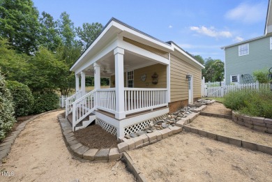 Explore this charming Charleston-style home in Sunset Ridge on Devils Ridge Golf Club in North Carolina - for sale on GolfHomes.com, golf home, golf lot