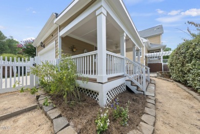 Explore this charming Charleston-style home in Sunset Ridge on Devils Ridge Golf Club in North Carolina - for sale on GolfHomes.com, golf home, golf lot