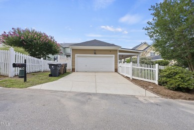 Explore this charming Charleston-style home in Sunset Ridge on Devils Ridge Golf Club in North Carolina - for sale on GolfHomes.com, golf home, golf lot