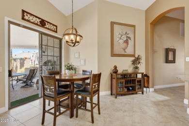 Charming home w/stone facade + extended paver front courtyard on Arizona Traditions Golf Club in Arizona - for sale on GolfHomes.com, golf home, golf lot