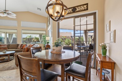 Charming home w/stone facade + extended paver front courtyard on Arizona Traditions Golf Club in Arizona - for sale on GolfHomes.com, golf home, golf lot