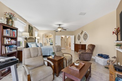 Charming home w/stone facade + extended paver front courtyard on Arizona Traditions Golf Club in Arizona - for sale on GolfHomes.com, golf home, golf lot