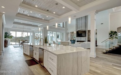 1737 S Moorings is a stunning coastal water front modern brick on Country Club of Landfall in North Carolina - for sale on GolfHomes.com, golf home, golf lot