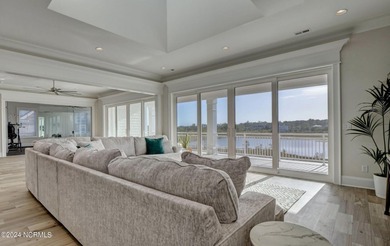 1737 S Moorings is a stunning coastal water front modern brick on Country Club of Landfall in North Carolina - for sale on GolfHomes.com, golf home, golf lot