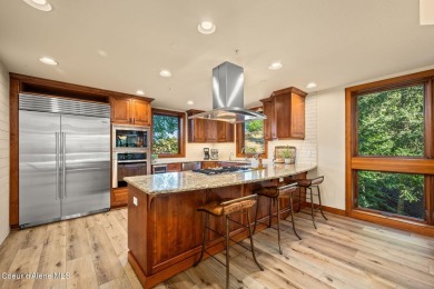 Overlooking the Sanders Beach neighborhood and Coeur d'Alene on Coeur D Alene Resort Golf Course in Idaho - for sale on GolfHomes.com, golf home, golf lot