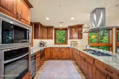 Overlooking the Sanders Beach neighborhood and Coeur d'Alene on Coeur D Alene Resort Golf Course in Idaho - for sale on GolfHomes.com, golf home, golf lot