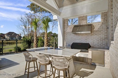 1737 S Moorings is a stunning coastal water front modern brick on Country Club of Landfall in North Carolina - for sale on GolfHomes.com, golf home, golf lot