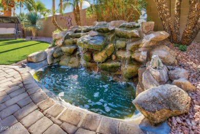 Charming home w/stone facade + extended paver front courtyard on Arizona Traditions Golf Club in Arizona - for sale on GolfHomes.com, golf home, golf lot