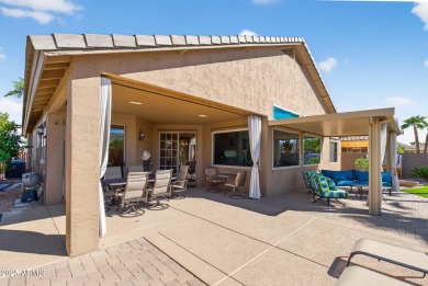 Charming home w/stone facade + extended paver front courtyard on Arizona Traditions Golf Club in Arizona - for sale on GolfHomes.com, golf home, golf lot