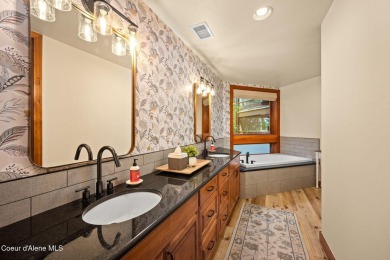 Overlooking the Sanders Beach neighborhood and Coeur d'Alene on Coeur D Alene Resort Golf Course in Idaho - for sale on GolfHomes.com, golf home, golf lot