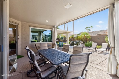 Charming home w/stone facade + extended paver front courtyard on Arizona Traditions Golf Club in Arizona - for sale on GolfHomes.com, golf home, golf lot