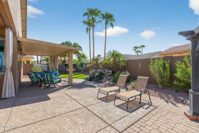 Charming home w/stone facade + extended paver front courtyard on Arizona Traditions Golf Club in Arizona - for sale on GolfHomes.com, golf home, golf lot