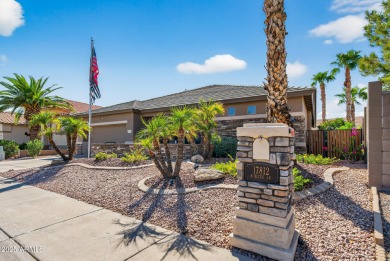 Charming home w/stone facade + extended paver front courtyard & on Arizona Traditions Golf Club in Arizona - for sale on GolfHomes.com, golf home, golf lot