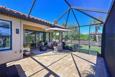 Welcome to resort-style living in Esplanade at Azario. This on Esplanade Golf and Country at Lakewood Ranch in Florida - for sale on GolfHomes.com, golf home, golf lot