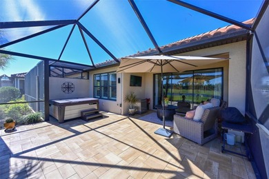 Welcome to resort-style living in Esplanade at Azario. This on Esplanade Golf and Country at Lakewood Ranch in Florida - for sale on GolfHomes.com, golf home, golf lot