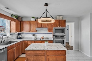 Beautifully updated 2-story residence tucked away at the end of on Sleepy Hole in Virginia - for sale on GolfHomes.com, golf home, golf lot