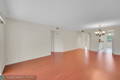 This 'JUNIPER' FLOOR PLAN HAS INSIDE WASHER/DRYER, UPDATED on Wynmoor Golf Course in Florida - for sale on GolfHomes.com, golf home, golf lot