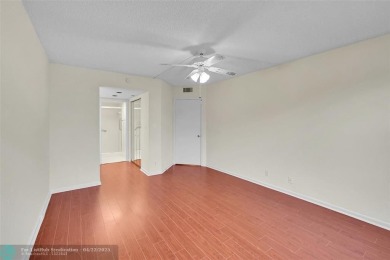 This 'JUNIPER' FLOOR PLAN HAS INSIDE WASHER/DRYER, UPDATED on Wynmoor Golf Course in Florida - for sale on GolfHomes.com, golf home, golf lot