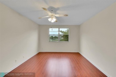 This 'JUNIPER' FLOOR PLAN HAS INSIDE WASHER/DRYER, UPDATED on Wynmoor Golf Course in Florida - for sale on GolfHomes.com, golf home, golf lot