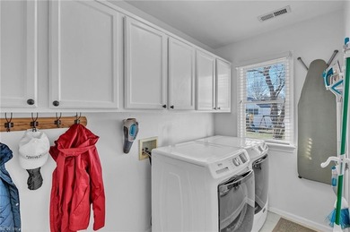 Beautifully updated 2-story residence tucked away at the end of on Sleepy Hole in Virginia - for sale on GolfHomes.com, golf home, golf lot