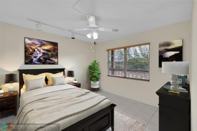 This 'JUNIPER' FLOOR PLAN HAS INSIDE WASHER/DRYER, UPDATED on Wynmoor Golf Course in Florida - for sale on GolfHomes.com, golf home, golf lot