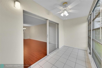 This 'JUNIPER' FLOOR PLAN HAS INSIDE WASHER/DRYER, UPDATED on Wynmoor Golf Course in Florida - for sale on GolfHomes.com, golf home, golf lot