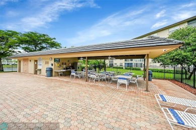 This 'JUNIPER' FLOOR PLAN HAS INSIDE WASHER/DRYER, UPDATED on Wynmoor Golf Course in Florida - for sale on GolfHomes.com, golf home, golf lot