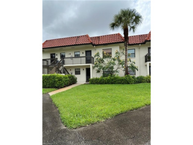 This furnished, turnkey ground-floor condo offers a lake view on Golden Gate Country Club in Florida - for sale on GolfHomes.com, golf home, golf lot