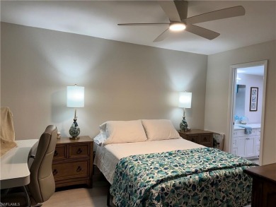 This furnished, turnkey ground-floor condo offers a lake view on Golden Gate Country Club in Florida - for sale on GolfHomes.com, golf home, golf lot