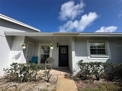 Enjoy easy Florida living in the desirable 55+ golf community of on Beacon Woods Golf Club in Florida - for sale on GolfHomes.com, golf home, golf lot