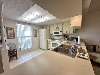 Enjoy easy Florida living in the desirable 55+ golf community of on Beacon Woods Golf Club in Florida - for sale on GolfHomes.com, golf home, golf lot