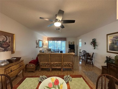 Enjoy easy Florida living in the desirable 55+ golf community of on Beacon Woods Golf Club in Florida - for sale on GolfHomes.com, golf home, golf lot