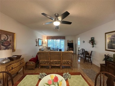 Enjoy easy Florida living in the desirable 55+ golf community of on Beacon Woods Golf Club in Florida - for sale on GolfHomes.com, golf home, golf lot