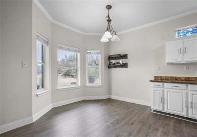 This stunning two story is perfectly situated between Shadow on White Bluff Resort - New Course in Texas - for sale on GolfHomes.com, golf home, golf lot