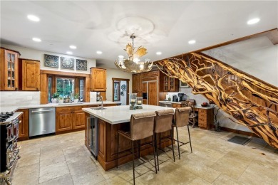 Tucked at the end of a forested cul-de-sac, this award-winning on Incline Village Golf Course in Nevada - for sale on GolfHomes.com, golf home, golf lot