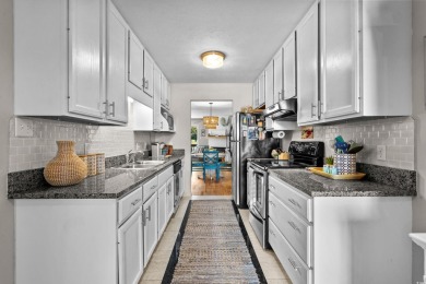 This beautifully renovated 3-bedroom, 3-bathroom townhome is a on Myrtlewood Golf Course and Club  in South Carolina - for sale on GolfHomes.com, golf home, golf lot