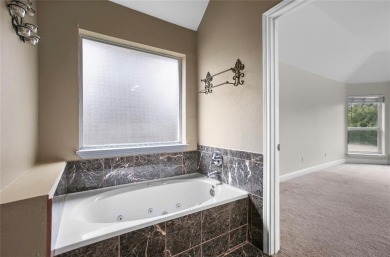This stunning two story is perfectly situated between Shadow on White Bluff Resort - New Course in Texas - for sale on GolfHomes.com, golf home, golf lot