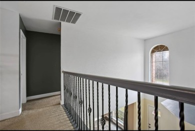 This stunning two story is perfectly situated between Shadow on White Bluff Resort - New Course in Texas - for sale on GolfHomes.com, golf home, golf lot