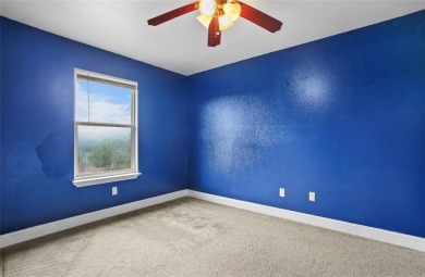 This stunning two story is perfectly situated between Shadow on White Bluff Resort - New Course in Texas - for sale on GolfHomes.com, golf home, golf lot