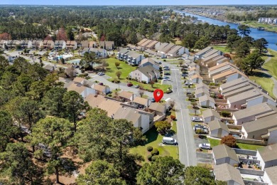 This beautifully renovated 3-bedroom, 3-bathroom townhome is a on Myrtlewood Golf Course and Club  in South Carolina - for sale on GolfHomes.com, golf home, golf lot