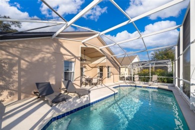 This beautifully maintained 4-bedroom, 2-bathroom pool home is on Ridgewood Lakes Golf and Country Club in Florida - for sale on GolfHomes.com, golf home, golf lot