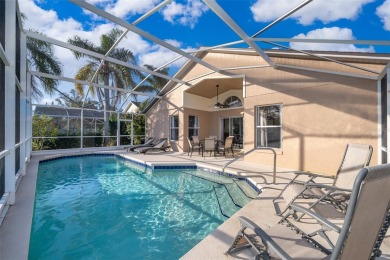 This beautifully maintained 4-bedroom, 2-bathroom pool home is on Ridgewood Lakes Golf and Country Club in Florida - for sale on GolfHomes.com, golf home, golf lot