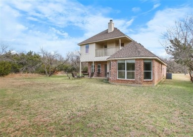 This stunning two story is perfectly situated between Shadow on White Bluff Resort - New Course in Texas - for sale on GolfHomes.com, golf home, golf lot
