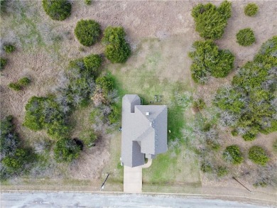 This stunning two story is perfectly situated between Shadow on White Bluff Resort - New Course in Texas - for sale on GolfHomes.com, golf home, golf lot