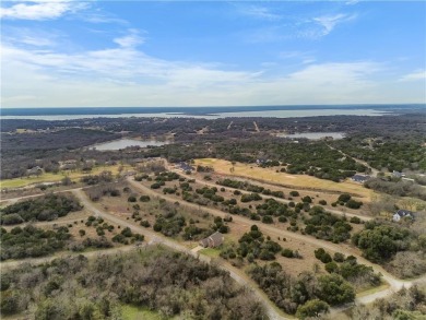 This stunning two story is perfectly situated between Shadow on White Bluff Resort - New Course in Texas - for sale on GolfHomes.com, golf home, golf lot