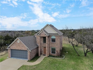 This stunning two story is perfectly situated between Shadow on White Bluff Resort - New Course in Texas - for sale on GolfHomes.com, golf home, golf lot