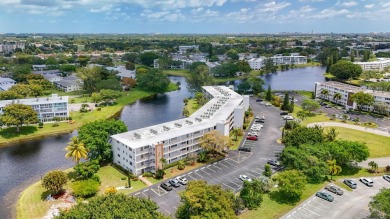 Great Location, fully remodeled and furnished with a modern on Hillsboro Pines Golf in Florida - for sale on GolfHomes.com, golf home, golf lot