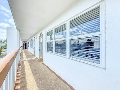 Great Location, fully remodeled and furnished with a modern on Hillsboro Pines Golf in Florida - for sale on GolfHomes.com, golf home, golf lot