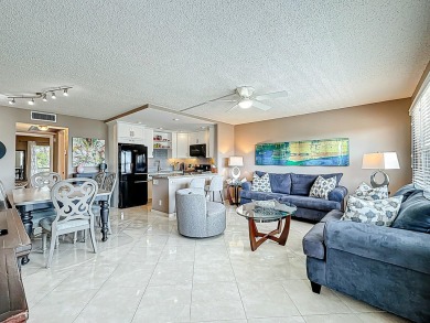 Great Location, fully remodeled and furnished with a modern on Hillsboro Pines Golf in Florida - for sale on GolfHomes.com, golf home, golf lot